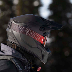 509 snowmobiler displaying helmet