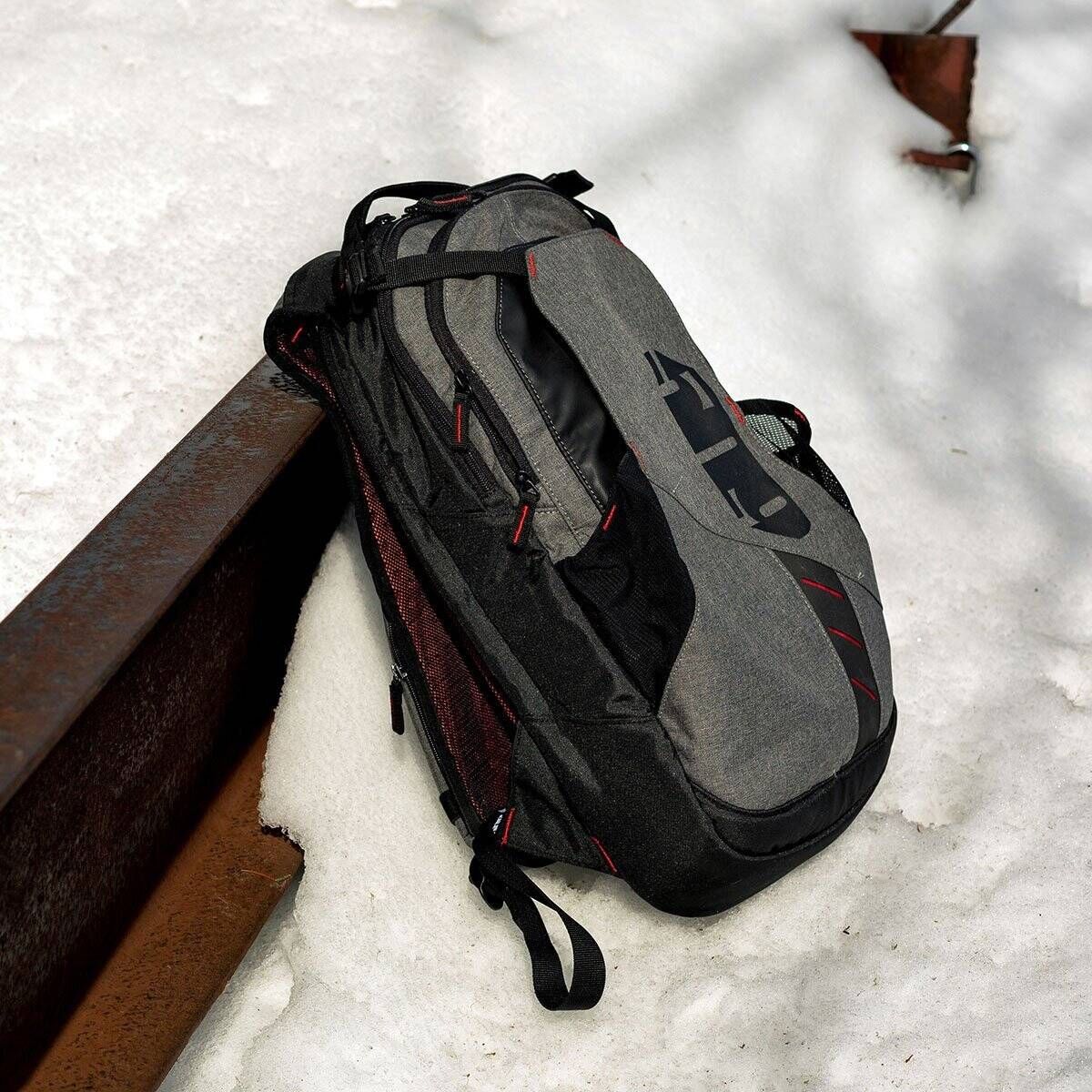 melee trail backpack laying in snow